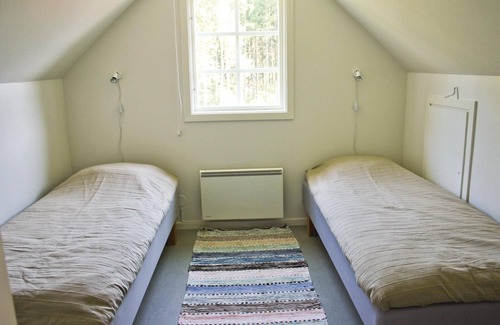 Vittsjo House | Beautiful cottage with fireplace for cool evenings.
