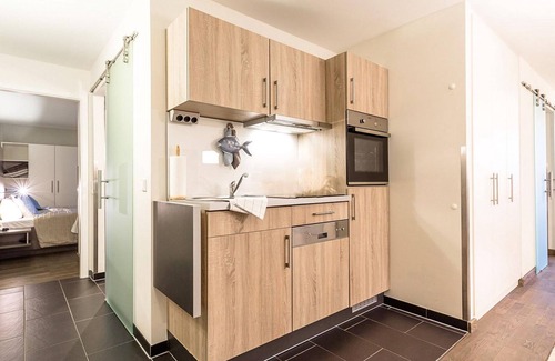 Wremen Apartment | Beautiful North Sea apartment with sauna, sunny balcony and wonderful country views