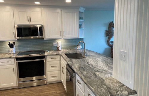 Pine Knoll Shores Condo | Beautiful First Floor Oceanfront Condo Steps to Beach and Pool