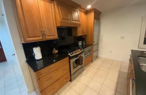 Traverse City House | Beautiful First Floor suite with patio to the Bay