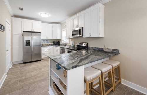 Siguenza Cove Cottage | Beautiful Fully Renovated Beach Cottage in the Purple Parrot Resort!