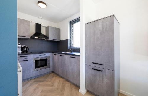 Ewijk House | Beautiful holiday home on park on swimming water