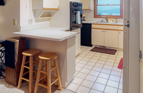 Sylvan Shores House | Beautiful home close to marina with Beaver Lake views & fireplace