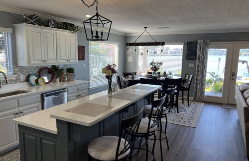 Mid America House | Beautiful home directly on the lake and minutes from stores and entertainment.