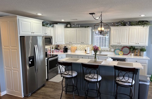 Mid America House | Beautiful home directly on the lake and minutes from stores and entertainment.
