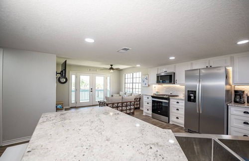 Cedar Lane House | Beautiful Home on Caney Creek w/Fishing Pier, Hot Tub, Fire Pit & Golf Cart!