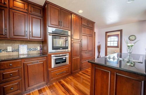 Rib Mountain House | Beautiful home on the Lake. Indoor Pool. Private Pier and a mile from Ski Hill