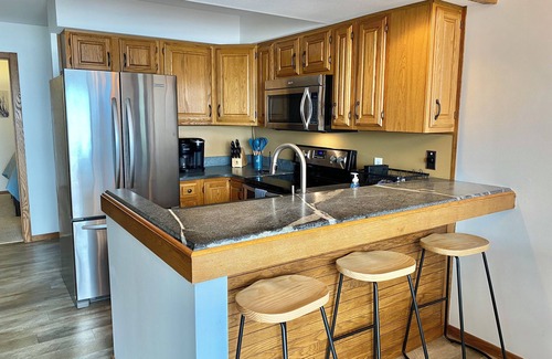 Higgins Lake House | Beautiful Home w/2 fireplaces, Deck, and 75ft of Private Higgins Lake Frontage