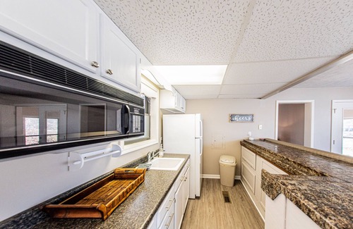 Gilbertsville House | Beautiful home with private boat dock, ramp, & hot tub near The Moors.