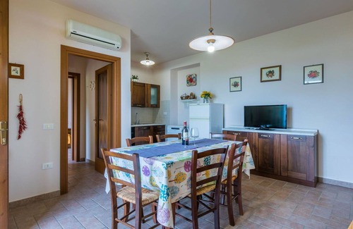 Castellina Marittima Apartment | Beautiful apartment with A/C, pool, WIFI, TV, patio, pets allowed, panoramic view and parking