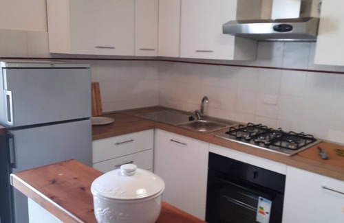 Rosignano Marittimo Villa | Beautiful apartment in villa for 10 guests with pool, TV, pets allowed and parking