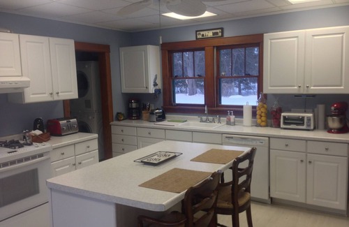 Mikana House | Beautiful lake-home, plus separate cottage, 200+ feet level shoreline,1.3 acres