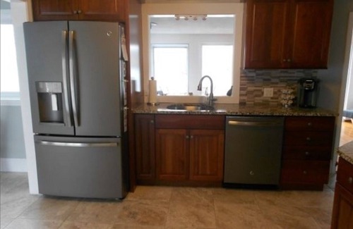 Laconia House | Beautiful lakefront home on Opechee, located mins. to skiing, shopping, & dining