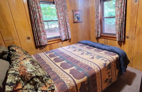 Arbor Vitae Cabin | Beautiful Northwoods Cabin with Large Deck, Dock, Community Firepit & kayaks