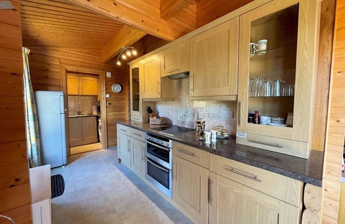Rockcliffe House | Beautiful Norwegian Lodge in Kippford with Garden Pass the Keys