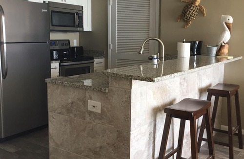 Long Beach Condo | Beautiful Oceanfront 1 Bedroom & FREE Beach Chairs & Umbrella