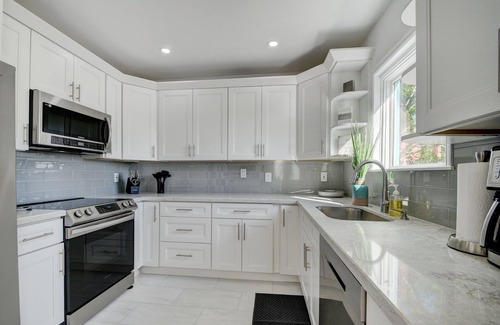 Parrot Cove House | Beautiful Pool home on Golf Course, with Intracoastal views, 1 mile to the Beach