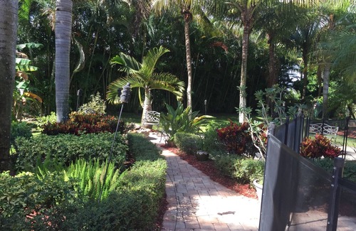Jensen Beach House | Beautiful private home Heated pool/waterfall & only 5 min to the local beaches.