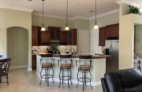 Fort Myers House | Beautiful ranch home on quiet canal with ocean access and spa.