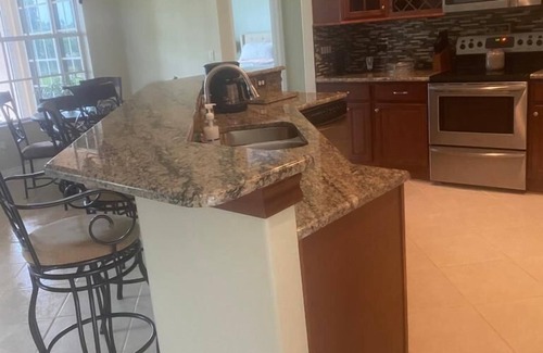 Fort Myers House | Beautiful ranch home on quiet canal with ocean access and spa.