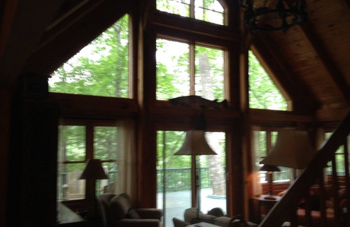 Lakemont Cabin | Beautiful Rustic Timberframe Lake House and Boat House Amid Trees