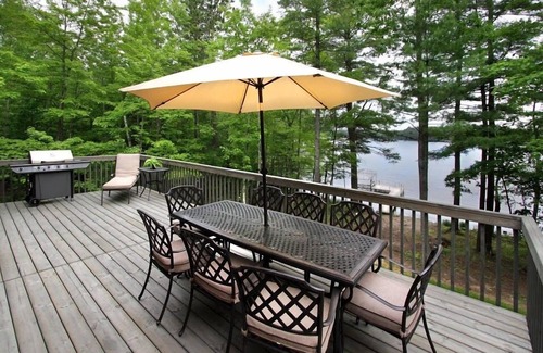 Eagle River House | Beautiful setting of charming house on Eagle River Chain of Lakes Catfish Lake