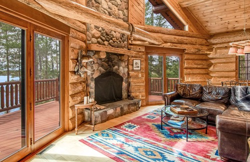 Land O Lakes House | Beautiful southwest lakefront home w/wood fireplace, deck, lake views, firepit
