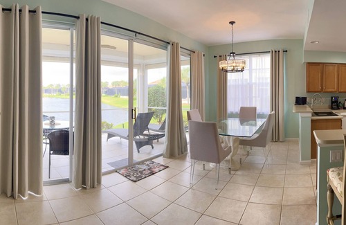 Catalina Isles House | Beautiful sunset and water view home in Crown Colony gated community.