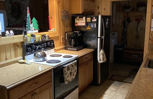 Kalkaska House | Beautiful Sunsets Over the all sport's, quiet Crawford Lake. Year round rental!