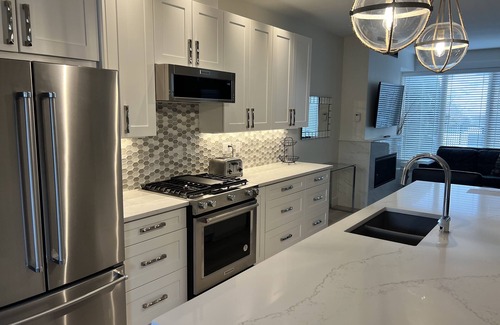 Westbank Condo | Beautiful Waterfront 1400 sq f, 2 level Condo ground floor walk out.