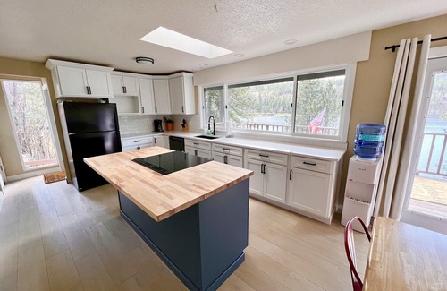 Coeur d'Alene House | Beautiful Waterfront Retreat with Your Own Beach, A Large Deck & Personal Dock!