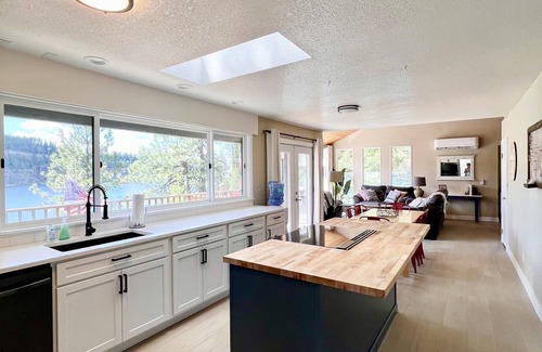 Coeur d'Alene House | Beautiful Waterfront Retreat with Your Own Beach, A Large Deck & Personal Dock!