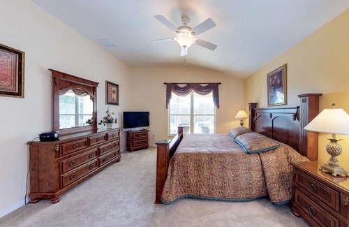 Sabal Harbour House | Beautiful Waterside Home with a Private Pool, Spa, and Lake Views