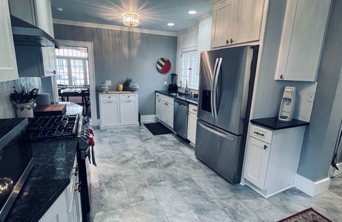 Rochester House | Beautifully Renovated 4BR Single Family Home. Sleeps 9 Pets Welcome: Brighton