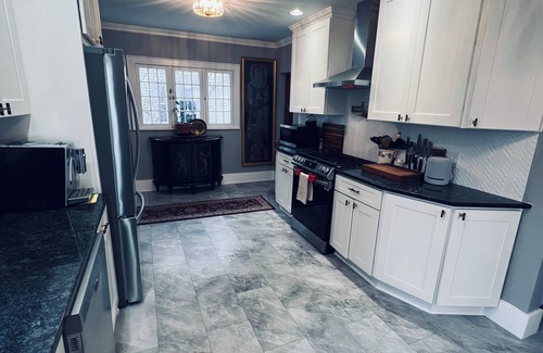 Rochester House | Beautifully Renovated 4BR Single Family Home. Sleeps 9 Pets Welcome: Brighton
