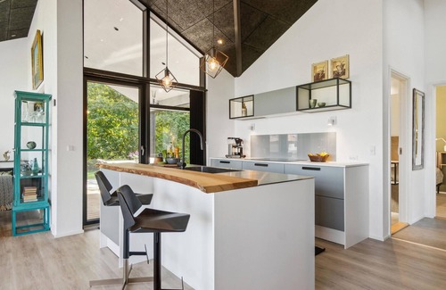 Hojslev House | Beautifully situated house on a natural plot with magnificent fjord views.