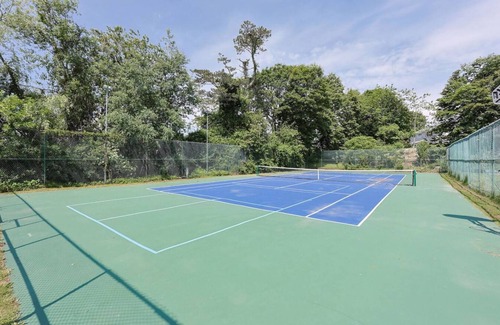 Gloucester House | Bell View: Private tennis court and an in-law