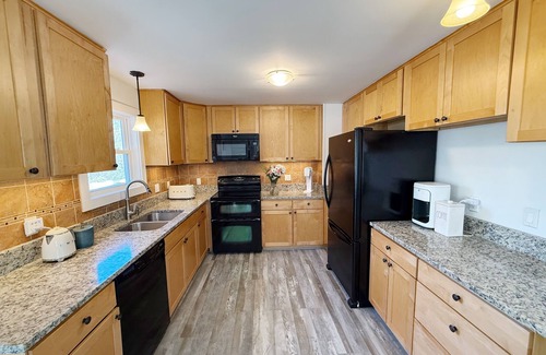 West Tisbury House | Beloved 5-bedroom house with Beach Passes, AC, fenced in yard, and hot tub