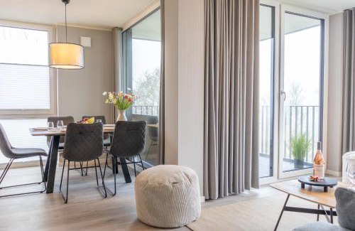 Marienleuchte Apartment | BeltBlick 3 - Moderne Ferienwohnung direkt an der Ostsee mit Meerblick und Sauna!
