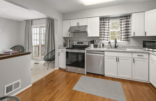 Potomac Falls House | Berkeley: Decked Patio & Near DC