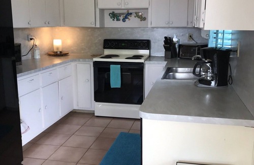 Key West House | Best of Both Worlds! 3 bedroom, pool, canal, boat dock. 9 miles from downtown!