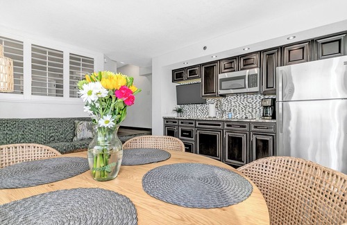 Windy Hill Condo | Best view at Beach Cove- Tropical oceanfront corner condo with double balcony!