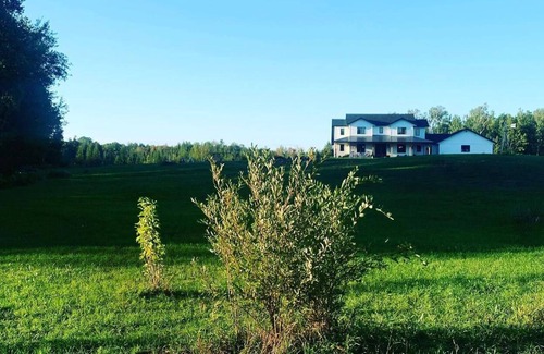 Lake Nebagamon House | Big Beautiful Farmhouse - Sunsets, Hot Tub, Fire Pit, Trails, farm fresh eggs!