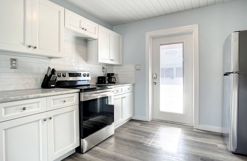 New Smyrna Beach House | Bikini Bottom Duplex with Pool! ~ 2 Minutes from Beach & Flagler Avenue