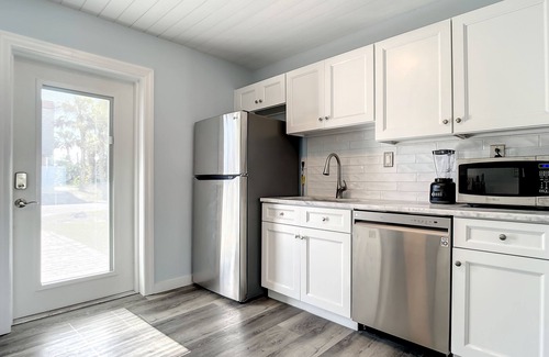 New Smyrna Beach House | Bikini Bottom Duplex with Pool! ~ 2 Minutes from Beach & Flagler Avenue