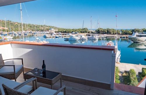 Porto Ottiolu House | Bilo e monocali sul molo 100m spiaggia by PortoOttioluAffitti