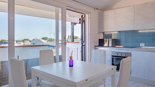 Porto Ottiolu House | Bilo e monocali sul molo 100m spiaggia by PortoOttioluAffitti