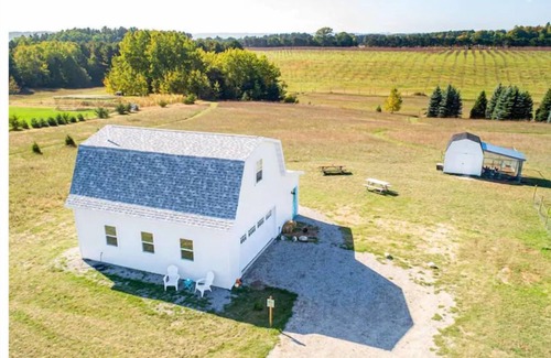 Suttons Bay Apartment | Birds Nest: Farm Stay with orchard views.