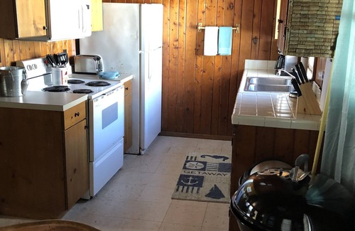 Kitty Hawk Cottage | Blackbeard's Retreat - Historic And Pet Friendly 3 Bedroom Cottage by RedAwning
