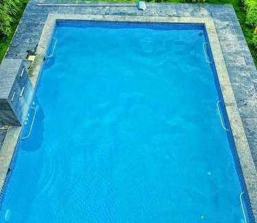 Chevella Villa | Blissora Retreat Villa by StayJade-Pvt Pool-Lawn
